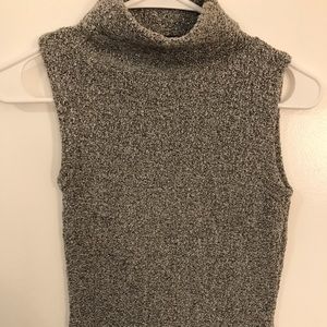 A grey sparkling short sleeve turtle neck